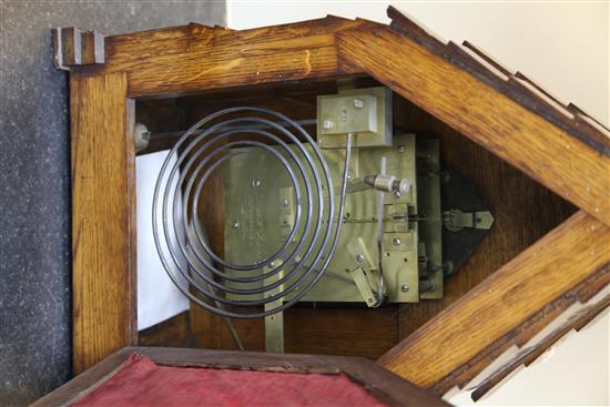 Carrew & Rule, Fenchurch Street, London. A Victorian Gothic design oak hour repeating bracket clock, clock 21in., bracket 15.5in.